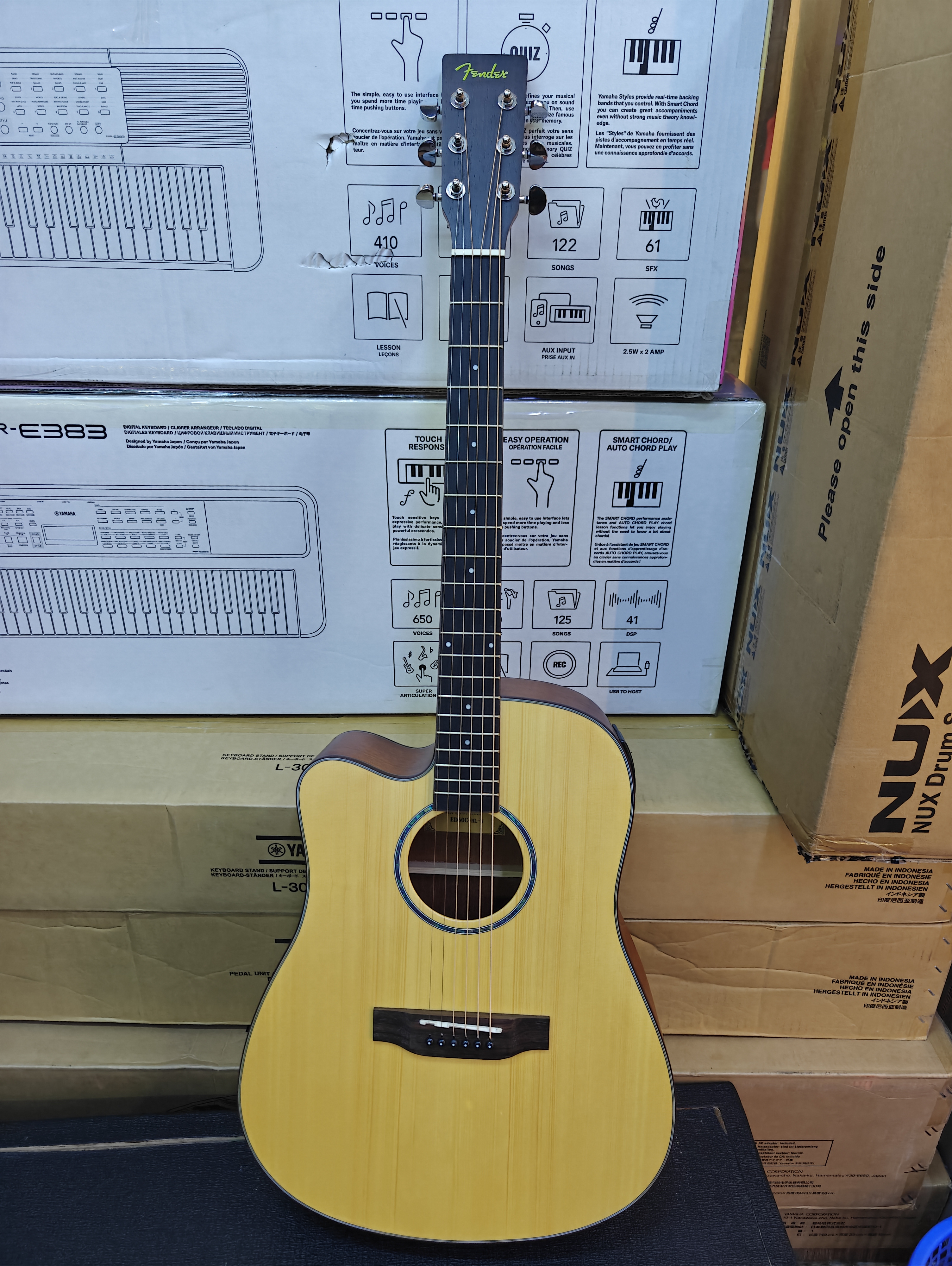 Maxtone 41-inch left-handed semi-acoustic guitar with cutaway body, built-in EQ pickup system, and natural wood finish.