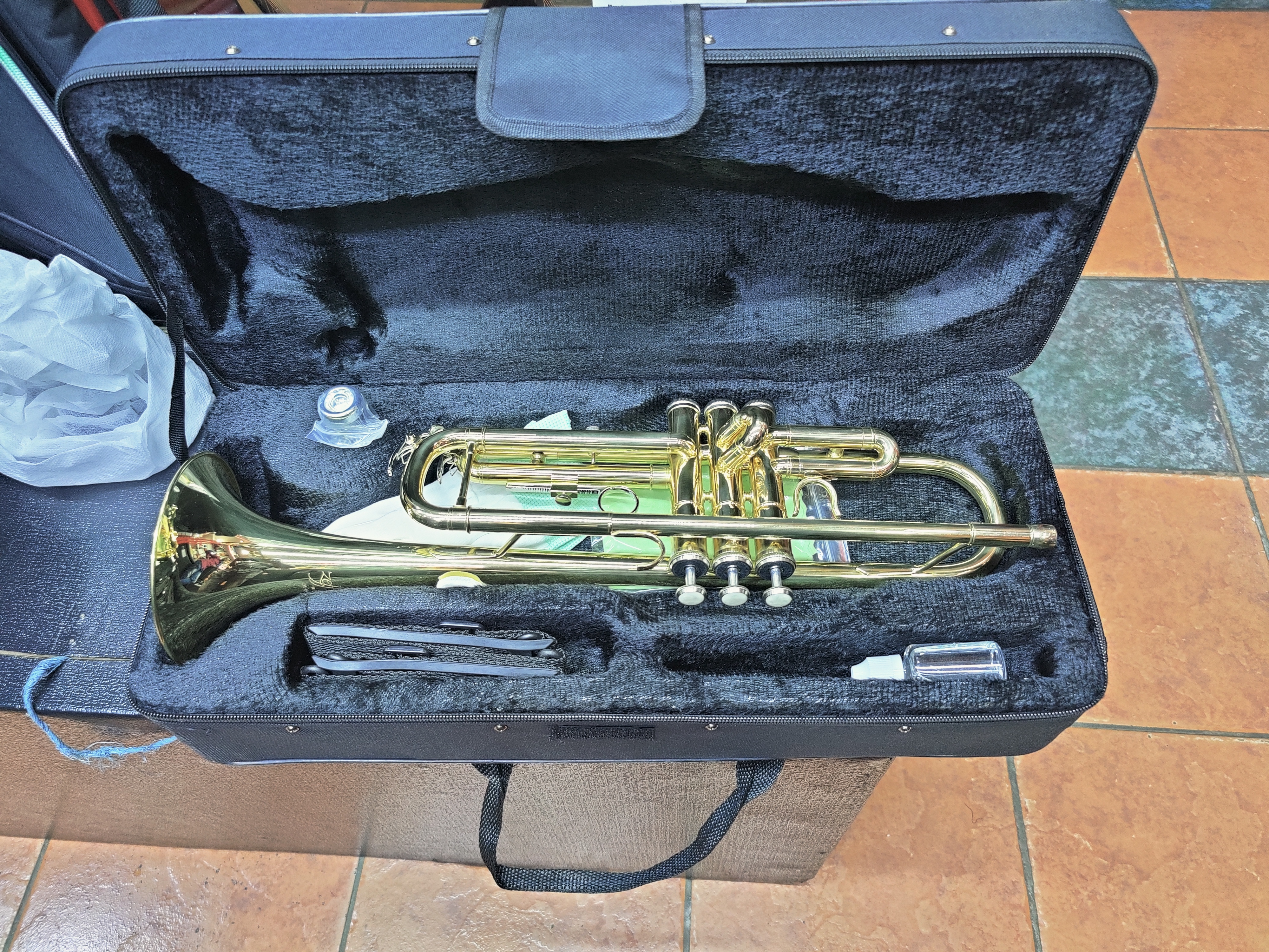 Premier England Trumpet brass musical instrument with carrying case for students, school bands, church musicians, and professional performances. Premier England Trumpet brass musical instrument with carrying case for students, school bands, church musicians, and professional performances.