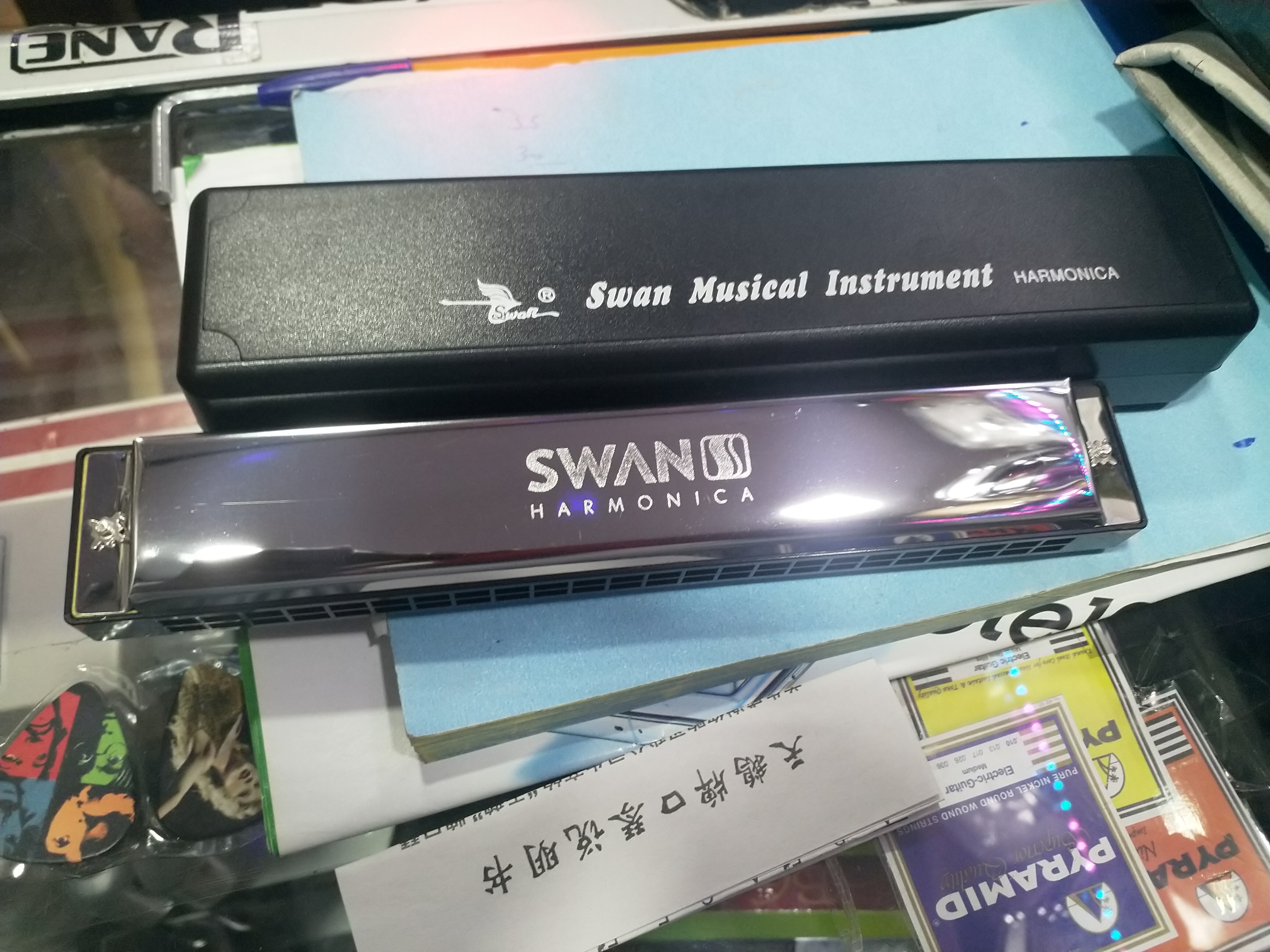 Swan 24 hole harmonica with plastic case