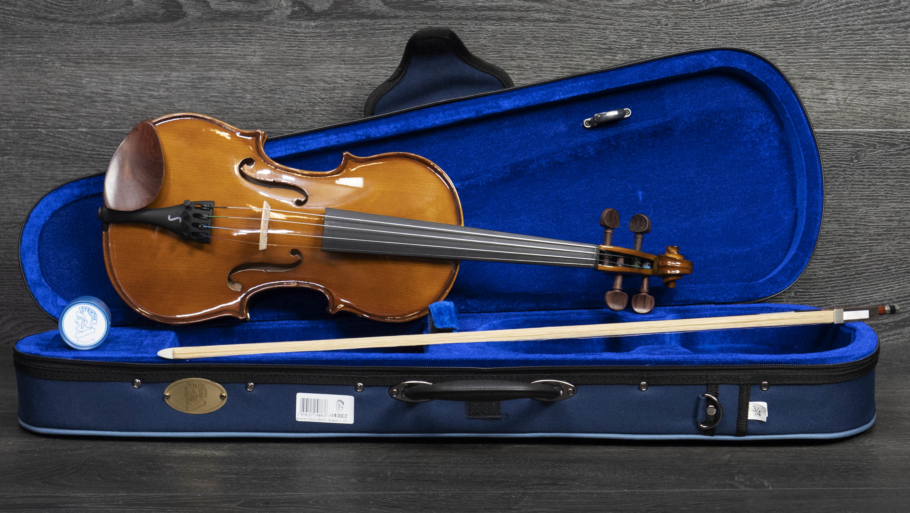 Buy the Stentor 1400A Violin Outfit, a high-quality beginner violin with a solid spruce top, maple body, wooden bow, protective case, and rosin. Perfect for students and school orchestras.